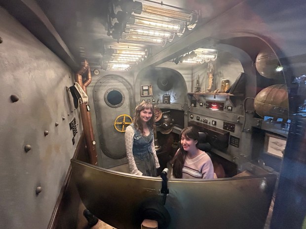 Sarah Schafer, left, design intern, and Sarah Trafford, senior experience designer, work inside a pod that resembles the set of 20,000 Leagues Under the Sea at NeoPangea, a design and marketing firm at 215 S. Fifth Ave., West Reading. (BILL UHRICH/MEDIANEWS GROUP)