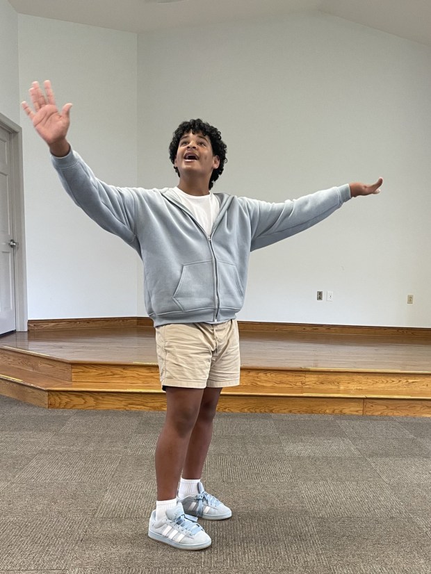 Brian Hood solos as Agwe, the God of Water, in the Reading Community Players youth musical 'Once on This Island JR' on June 26 and 27.  (Photo courtesy of Debbi Silas, Reading Community Players)
