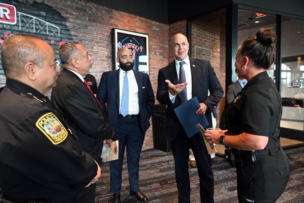 Pennsylvania Attorney General David W. Sunday Jr., second from right, talks with from left Reading Police Chief Javier Ortiz, Reading Mayor Eddie Moran, Reading Managing Director Jack R. Gombach and Berks County Sheriff Mandy Miller prior to the 50th anniversary Reading Police Academy graduating class ceremony in the Redner's Event Center at FirstEnergy Stadium on Friday, June 26, 2026. (BILL UHRICH/READING EAGLE)