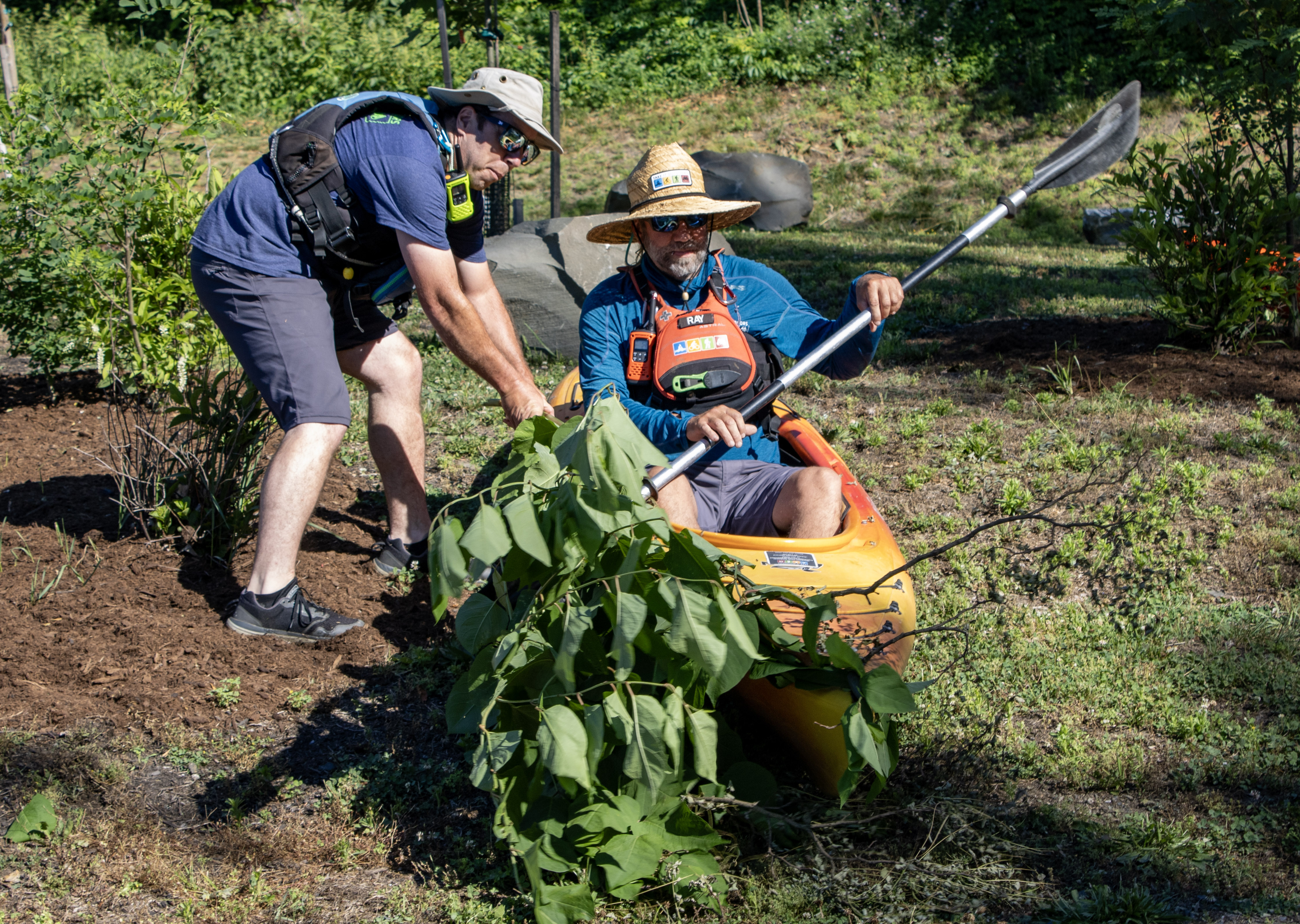 A safety presentation demonstrates how to navigate river hazards such...