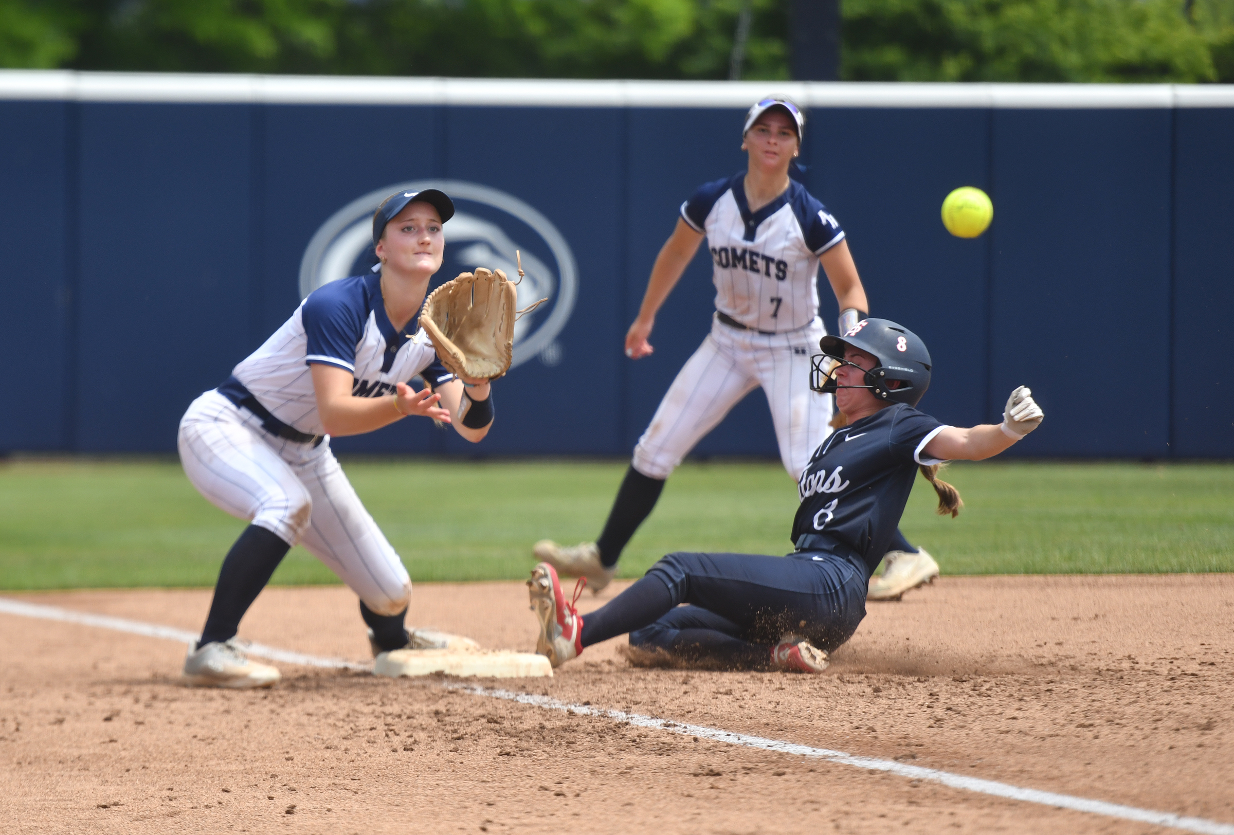 Abington Heights third baseman Ella Long makes the play as...