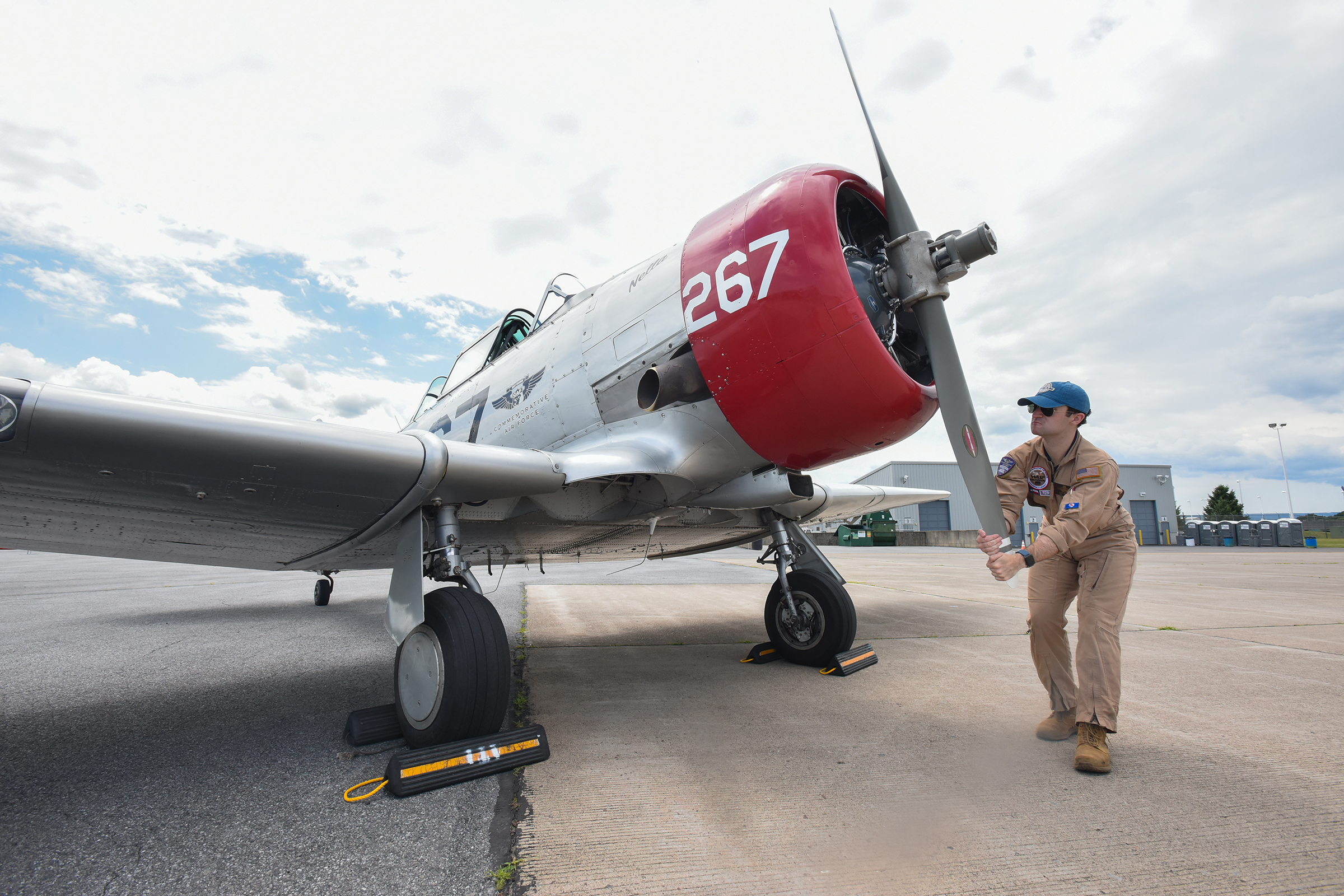 Pilot with the Commemorative Air Force Alex Beckett does a...
