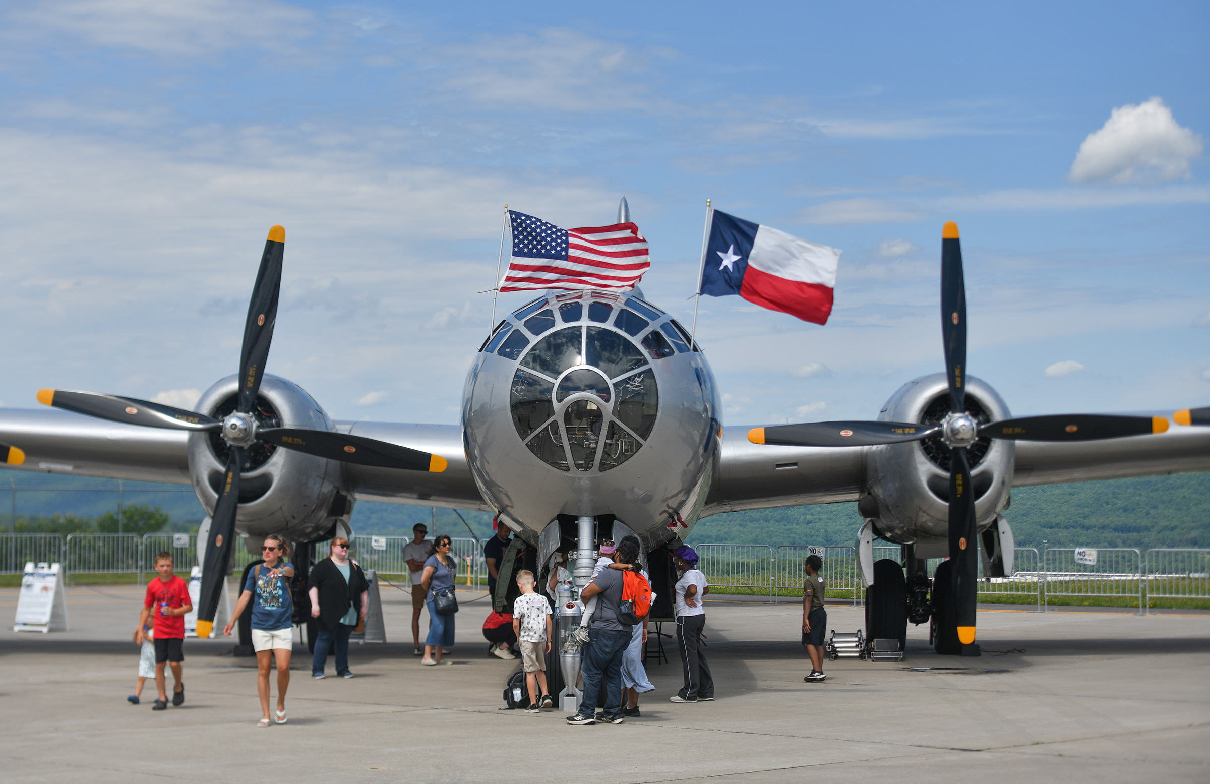 People visit the Boeing B-29 Superfortress heavy bomber plane during...