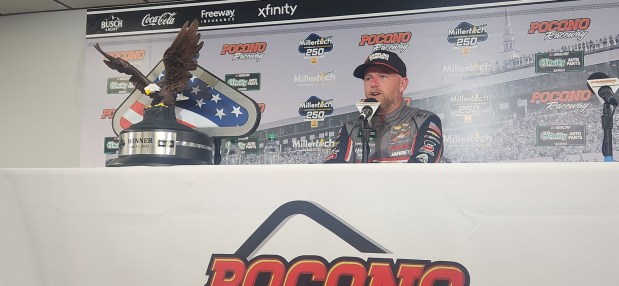 Justin Allgaier speaks at a press conference after winning the O'Reilly Auto Parts Series MillerTech Battery 250 on Saturday at Pocono Raceway. SCOTT WALSH / STAFF PHOTO