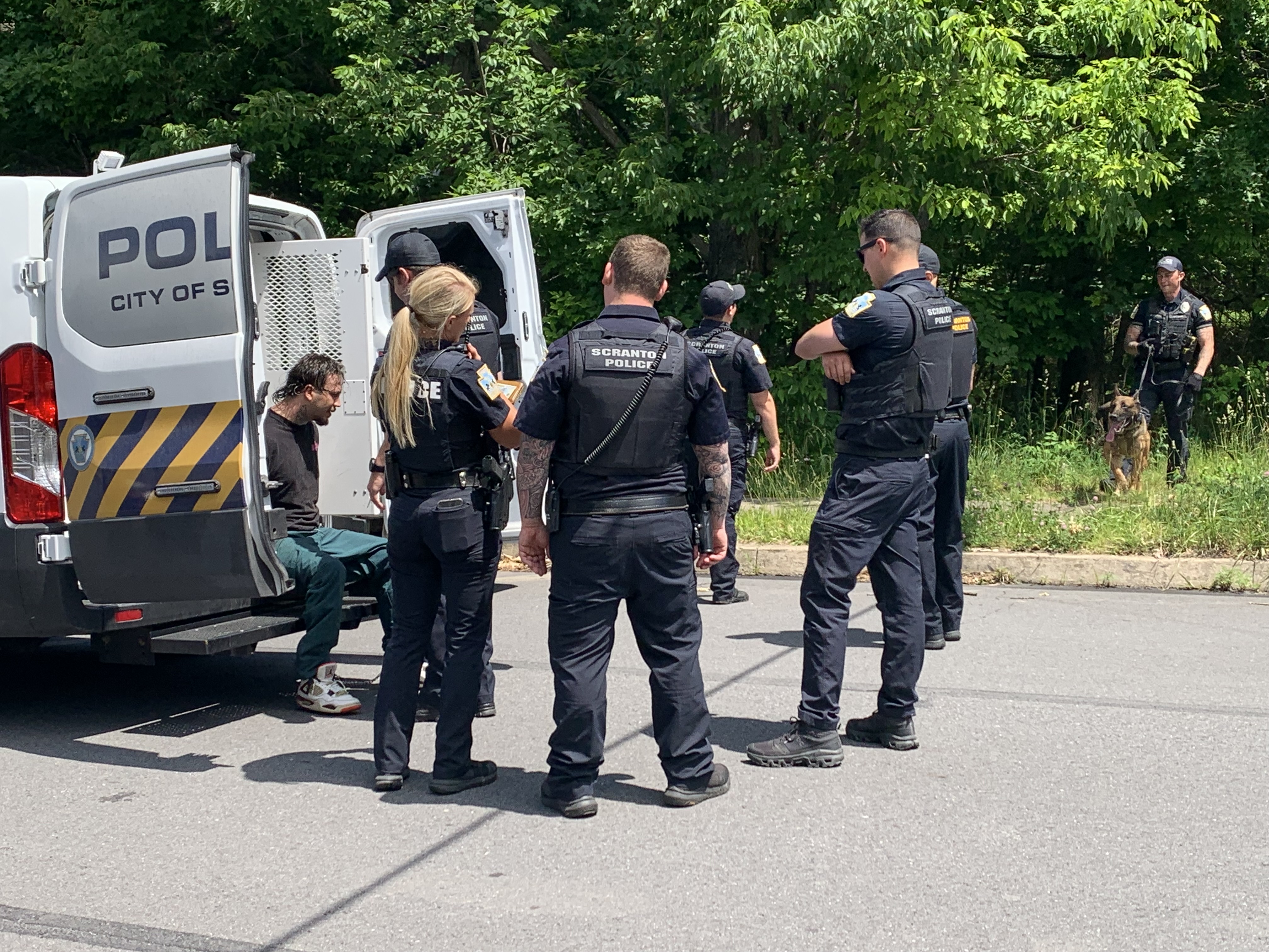 Scranton police apprehended a man, seated on the rear of...