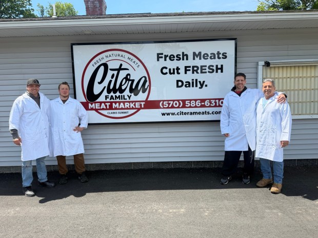 A Citera Family Meat Market location is opening at the former Trovato's Meat Market location along Lackawanna Trail in Glenburn Twp. From left, Joseph Sancimo Jr., apprentice butcher; Jake Nehme, head butcher; Joseph Sancimo, co-owner; and Mark Citera, co-owner. (ROBERT TOMKAVAGE/STAFF PHOTO)