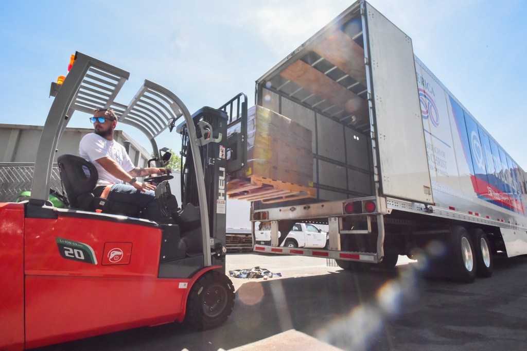 Blessing on wheels: Mormons bring truckload of food to Scranton pantry