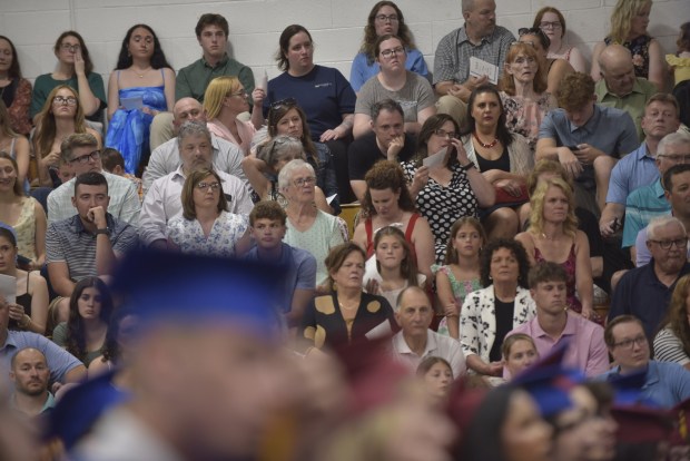 Friends and family listen to commencement exercises at Dunmore High School on Wednesday, June 10, 2026. (CHAD SEBRING/STAFF PHOTO)