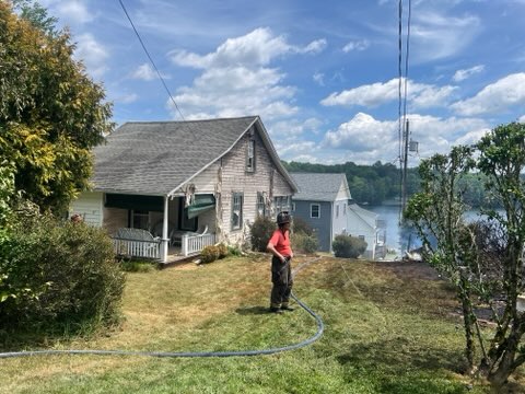 Emergency responders work at the scene after a series of...