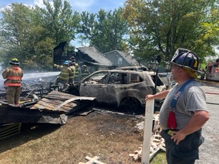Emergency responders work at the scene after a series of...