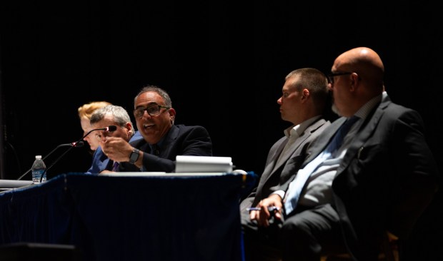 Michael Bahtiarian of Cambridge, Massachusetts-based Acentech, representing Project Green Mountain, answers a question during a conditional use hearing at the Valley View High School auditorium in Archbald on Thursday, June 18, 2026. (FRANK WILKES LESNEFSKY / STAFF PHOTO)