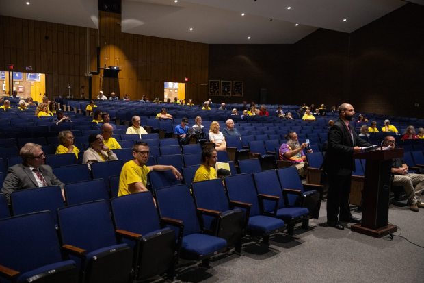 Attorney Justin Richards, who represents Archbald residents opposing data centers, questions a data center representative during a conditional use hearing at the Valley View High School auditorium in Archbald on Thursday, June 18, 2026. (FRANK WILKES LESNEFSKY / STAFF PHOTO)