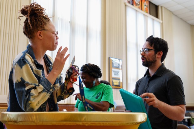Attendees talk during a Juneteenth open house hosted at the Black Scranton Project Center for Arts & Culture in Scranton, Pa., on Friday, June 19, 2026. (ISAAC DIAZ/STAFF PHOTO)