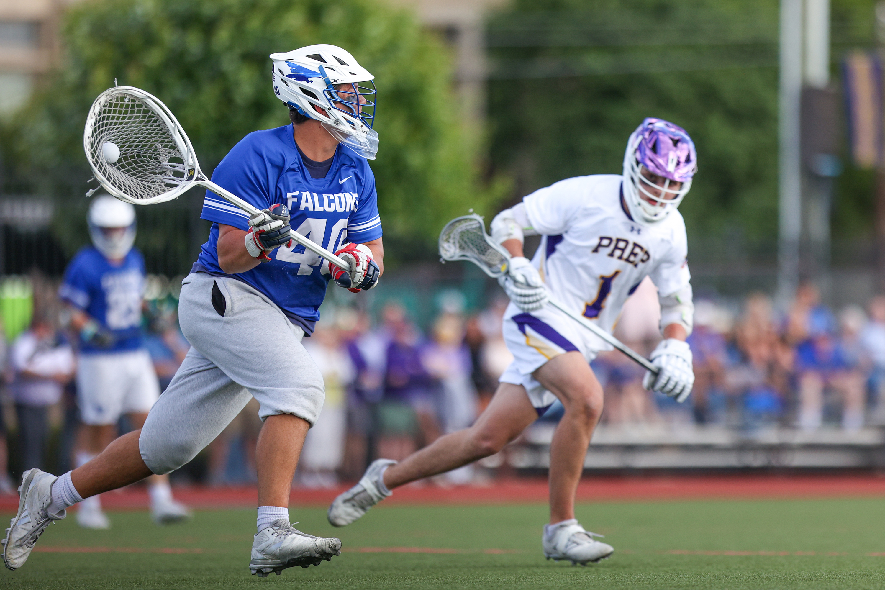 Scranton Prep’s Owen McPartland (1) pursues Lower Dauphin goalie Cohen...