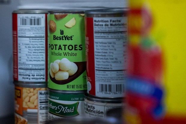 Cans sit on a shelf at the Valley Village of Volunteers' food pantry in Dickson City Community Building on Thursday, May 28, 2026. (REBECCA PARTICKA/STAFF PHOTOGRAPHER)