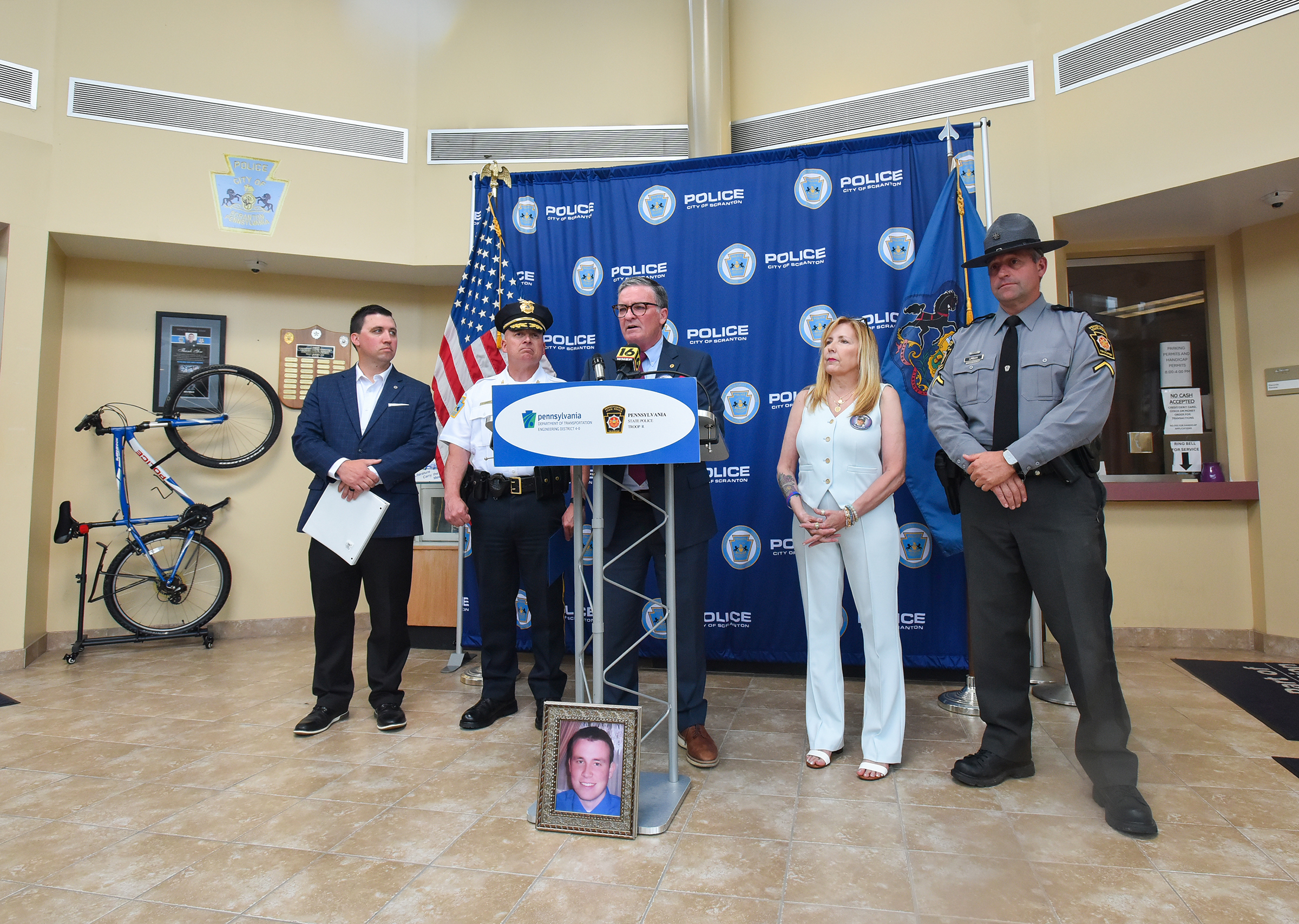 Pennsylvania Secretary of Transportation Mike Carroll, center, speaks about Paul...