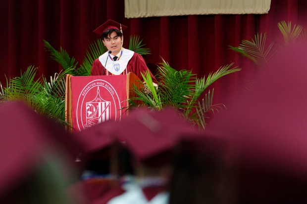 Peter Kwee, valedictorian of the Class of 2026, delivers a speech during the Scranton High School graduation ceremony in Scranton, Pa., on Tuesday, June 9, 2026. (ISAAC DIAZ/STAFF PHOTO)