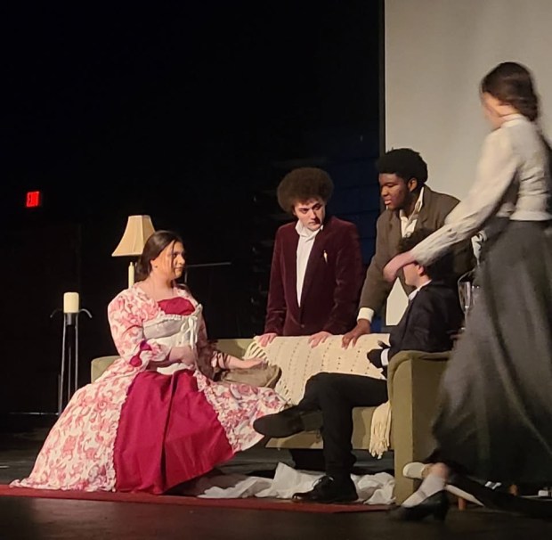 At left, in red, Abigail Van Wert performs. (COURTESY OF ABIGAIL VAN WERT)