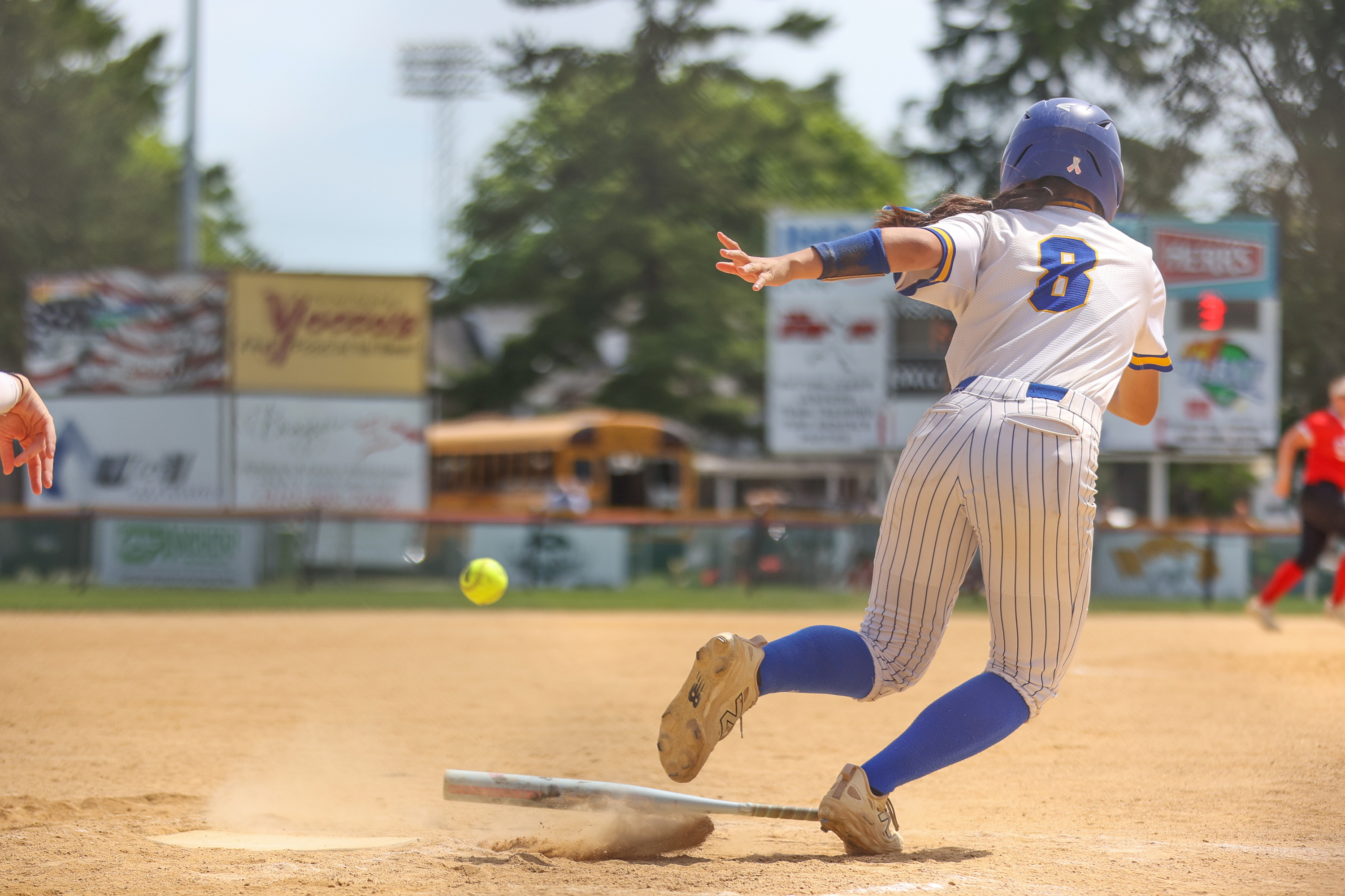 Valley View’s Ella Swingle (8) lays down a bunt in...