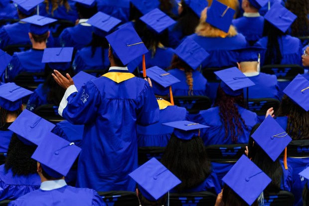 A graduate stands after being recognized for an award during the West Scranton High School graduation ceremony at the Student Union Gymnasium in Scranton, Pa., on Tuesday, June 9, 2026. (ISAAC DIAZ/STAFF PHOTO)