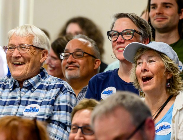 Attendees react Wednesday, June 3, 2026, during a general election kickoff event in Whitehall Township for Bob Brooks' congressional campaign. Brooks, a Democrat and former Bethlehem firefighter, is challenging Republican Rep. Ryan Mackenzie to represent the Lehigh Valley's 7th District. (April Gamiz/The Morning Call)