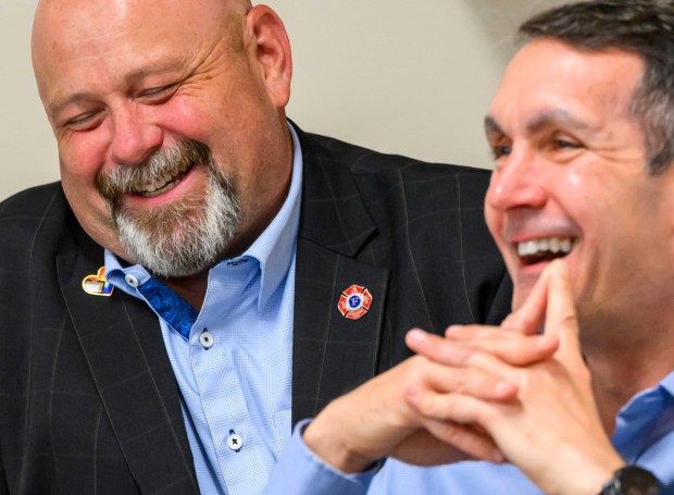 Bob Brooks and Pennsylvania Democratic Party Chair Eugene DePasquale react Wednesday, June 3, 2026, in Whitehall Township during a general election kickoff event for Brooks' congressional campaign. Brooks, a Democrat and former Bethlehem firefighter, is challenging Republican Rep. Ryan Mackenzie to represent the Lehigh Valley's 7th District. (April Gamiz/The Morning Call)