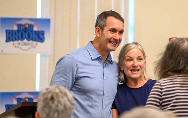 Pennsylvania Democratic Party Chair Eugene DePasquale and Former U.S. Rep. Susan Wild, D-7th District pose for a picture Wednesday, June 3, 2026, in Whitehall Township during a general election kickoff event for Bob Brooks' congressional campaign. Brooks, a Democrat and former Bethlehem firefighter, is challenging Republican Rep. Ryan Mackenzie to represent the Lehigh Valley's 7th District. (April Gamiz/The Morning Call)