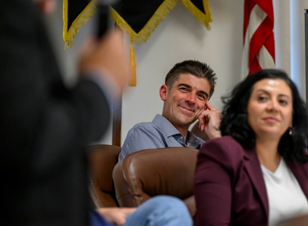 Former candidates Carol Obando-Derstine and Ryan Crosswell react as Bob Brooks speaks on Wednesday, June 3, 2026, in Whitehall Township during a general election kickoff event for his congressional campaign. Brooks, a Democrat and former Bethlehem firefighter, is challenging Republican Rep. Ryan Mackenzie to represent the Lehigh Valley's 7th District. pose for a picture Wednesday, June 3, 2026, in Whitehall Township during a general election kickoff event for Bob Brooks' congressional campaign. Brooks, a Democrat and former Bethlehem firefighter, is challenging Republican Rep. Ryan Mackenzie to represent the Lehigh Valley's 7th District. (April Gamiz/The Morning Call)
