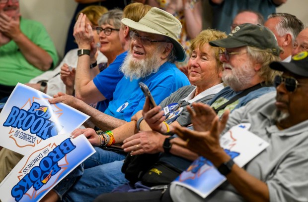 Attendees react Wednesday, June 3, 2026, during a general election kickoff event in Whitehall Township for Bob Brooks' congressional campaign. Brooks, a Democrat and former Bethlehem firefighter, is challenging Republican Rep. Ryan Mackenzie to represent the Lehigh Valley's 7th District. (April Gamiz/The Morning Call)