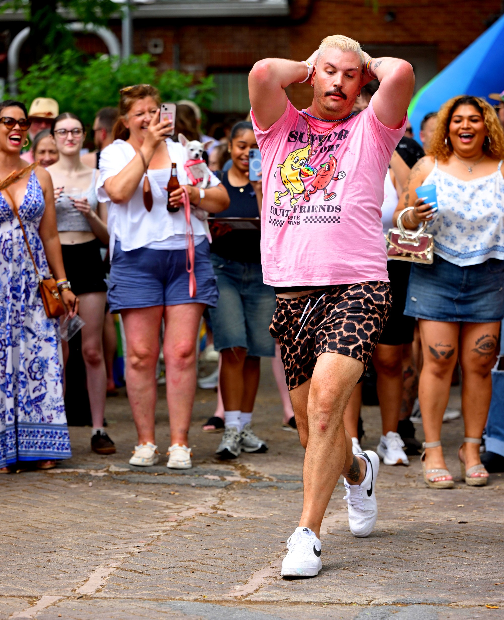 Scottie "Prime" Tocci dances and entertains attendees Sunday, June 14, 2026, at Pride Party Palooza at the Sun Inn in Bethlehem. Tocci is the event's organizer and hosted throughout the afternoon. Pride Party Palooza benefits the Eastern Pa Trans Equity Project. (Monica Cabrera/The Morning Call)