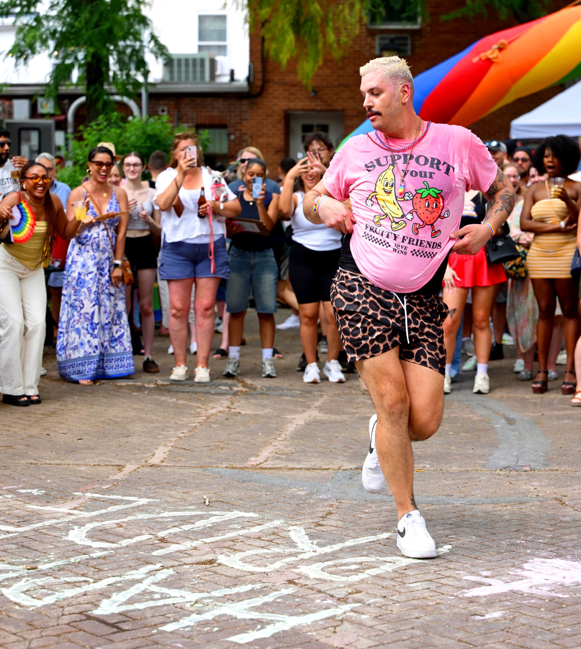 Scottie "Prime" Tocci dances and entertains attendees Sunday, June 14, 2026, at Pride Party Palooza at the Sun Inn in Bethlehem. Tocci is the event's organizer and hosted throughout the afternoon. Pride Party Palooza benefits the Eastern Pa Trans Equity Project. (Monica Cabrera/The Morning Call)