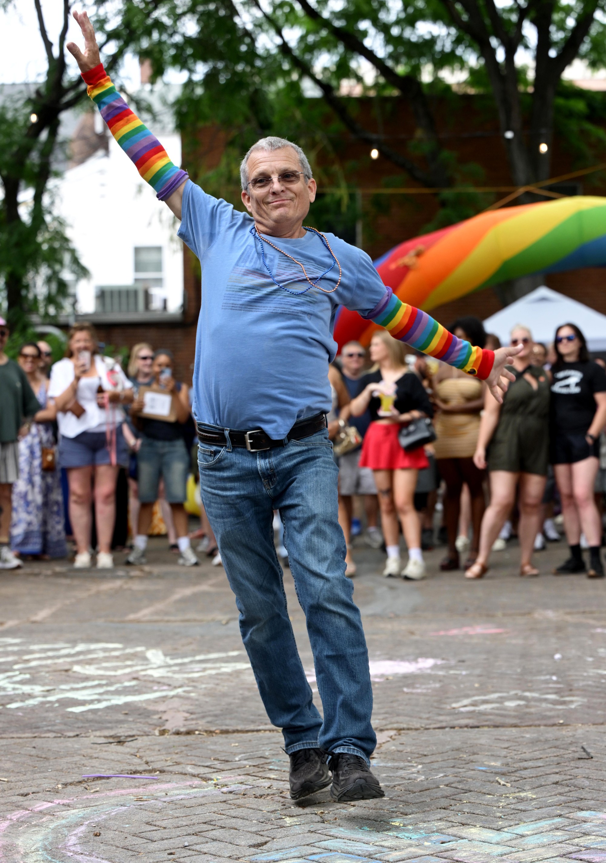 Attendees enjoy themselves Sunday, June 14, 2026, during the walk on the catwalk contest, at the Annual Pride Party Palooza event at the Sun Inn Courtyard in Bethlehem. The afternoon event featured drag performances, music by DJ Brad Scott, vendors, and interactive entertainment. The Pride Party Palooza benefits the Eastern Pa Trans Equity Project. (Monica Cabrera/The Morning Call)