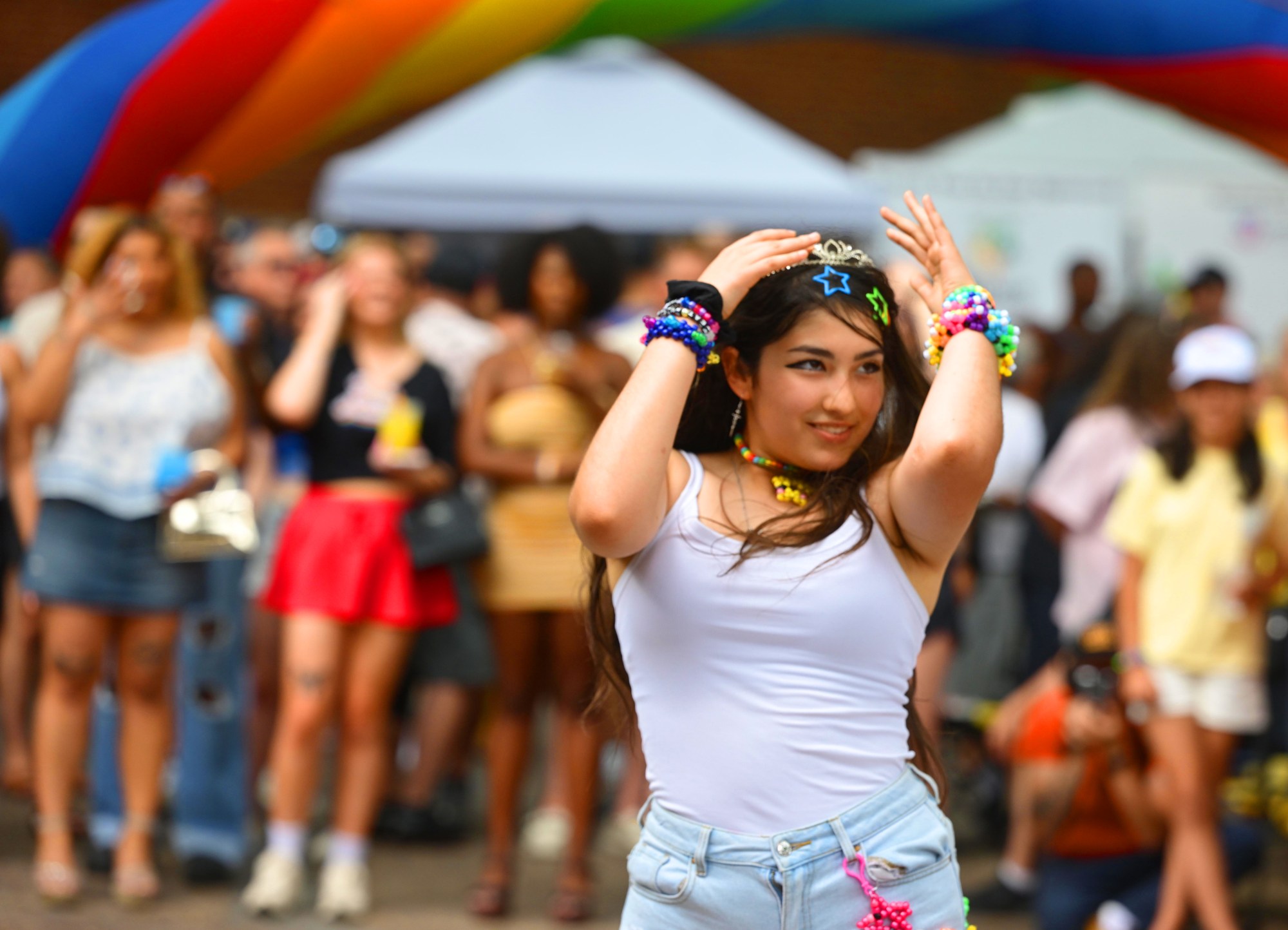 Attendees enjoy themselves Sunday, June 14, 2026, during the walk on the catwalk contest, at the Annual Pride Party Palooza event at the Sun Inn Courtyard in Bethlehem. The afternoon event featured drag performances, music by DJ Brad Scott, vendors, and interactive entertainment. The Pride Party Palooza benefits the Eastern Pa Trans Equity Project. (Monica Cabrera/The Morning Call)