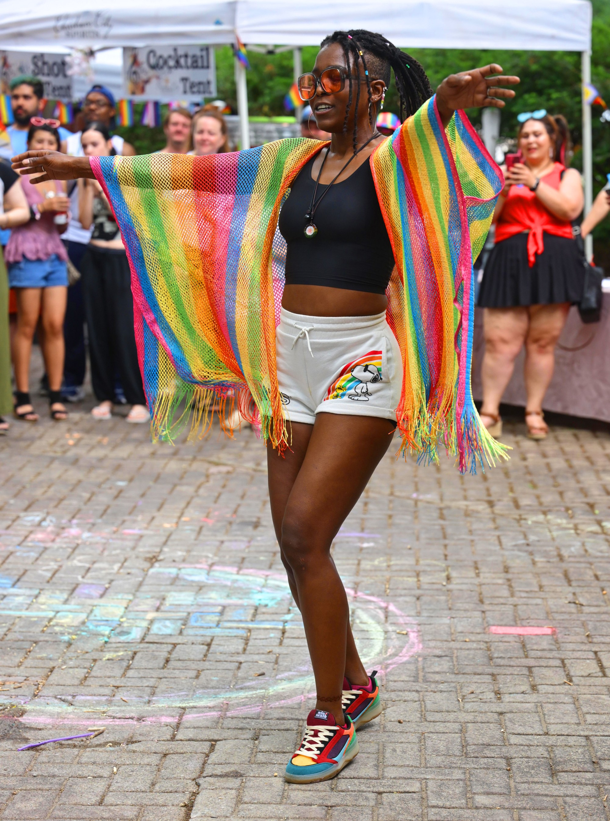 Attendees enjoy themselves Sunday, June 14, 2026, during the walk on the catwalk contest, at the Annual Pride Party Palooza event at the Sun Inn Courtyard in Bethlehem. The afternoon event featured drag performances, music by DJ Brad Scott, vendors, and interactive entertainment. The Pride Party Palooza benefits the Eastern Pa Trans Equity Project. (Monica Cabrera/The Morning Call)