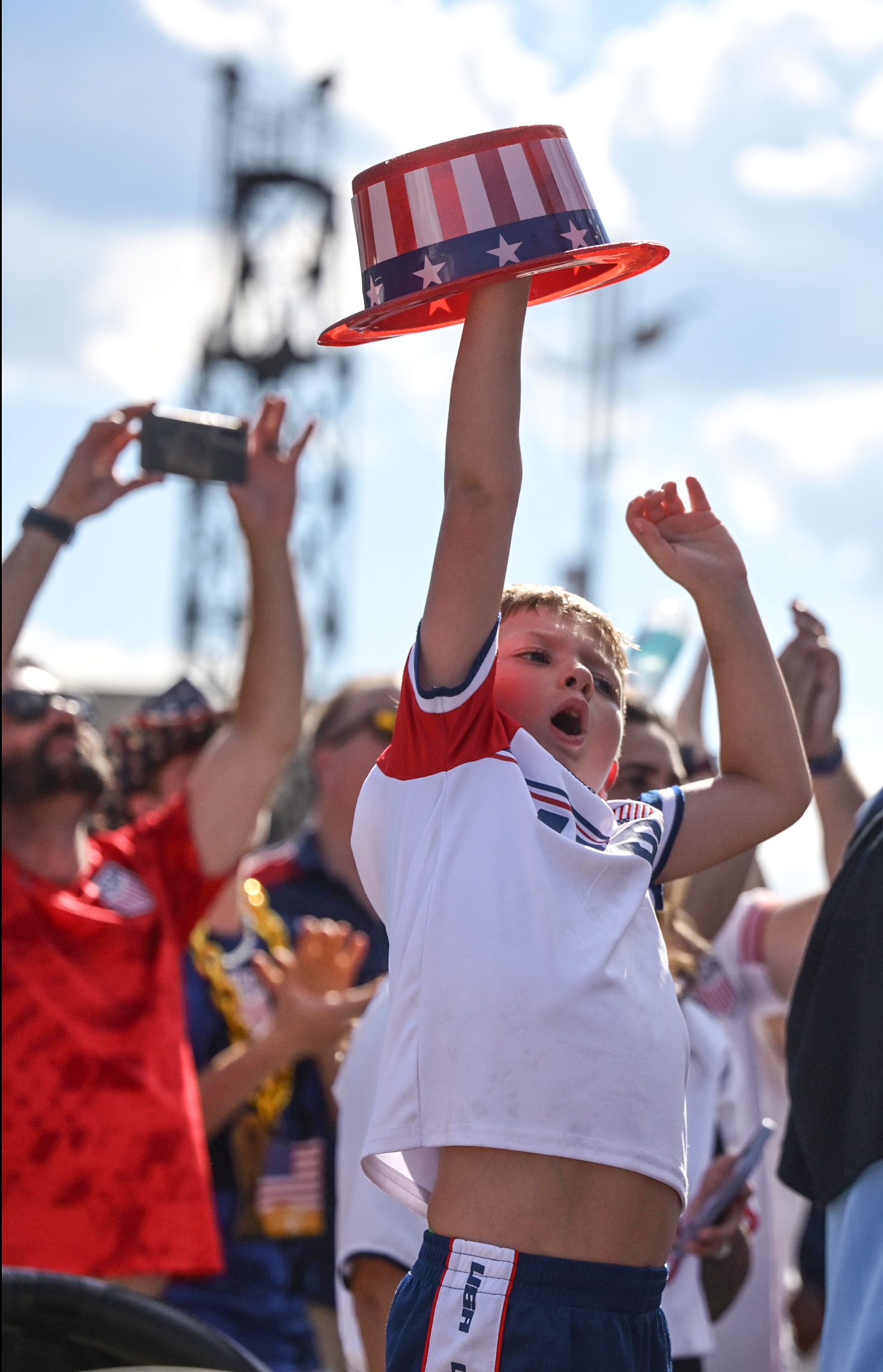 Conner Bullen, 6, of Bethlehem, holds his hat up high on Friday, June 19, 2026, after he watches the United States defeat Australia 2-0 to reach World Cup knockouts at the Lehigh Valley SoccerFest and Viewing Party at SteelStacks in Bethlehem. (Monica Cabrera/The Morning Call)