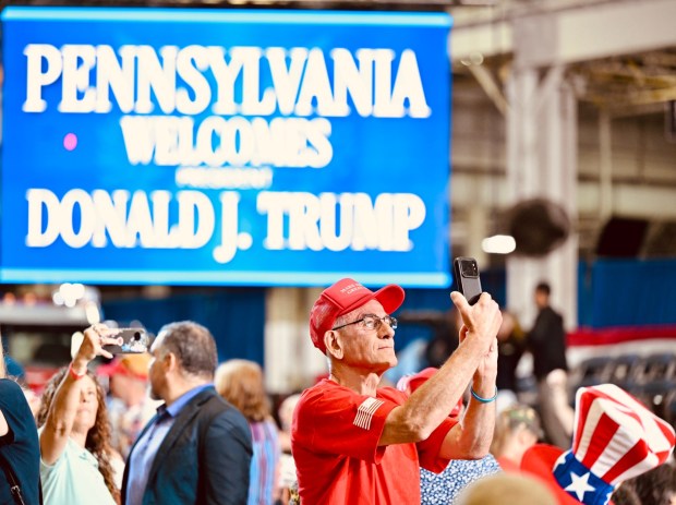 People get ready to take their seats Tuesday, June 23, 2026, to see President Donald Trump speak at the Mack Truck plant in Lower Macungie Township. (April Gamiz/The Morning Call)