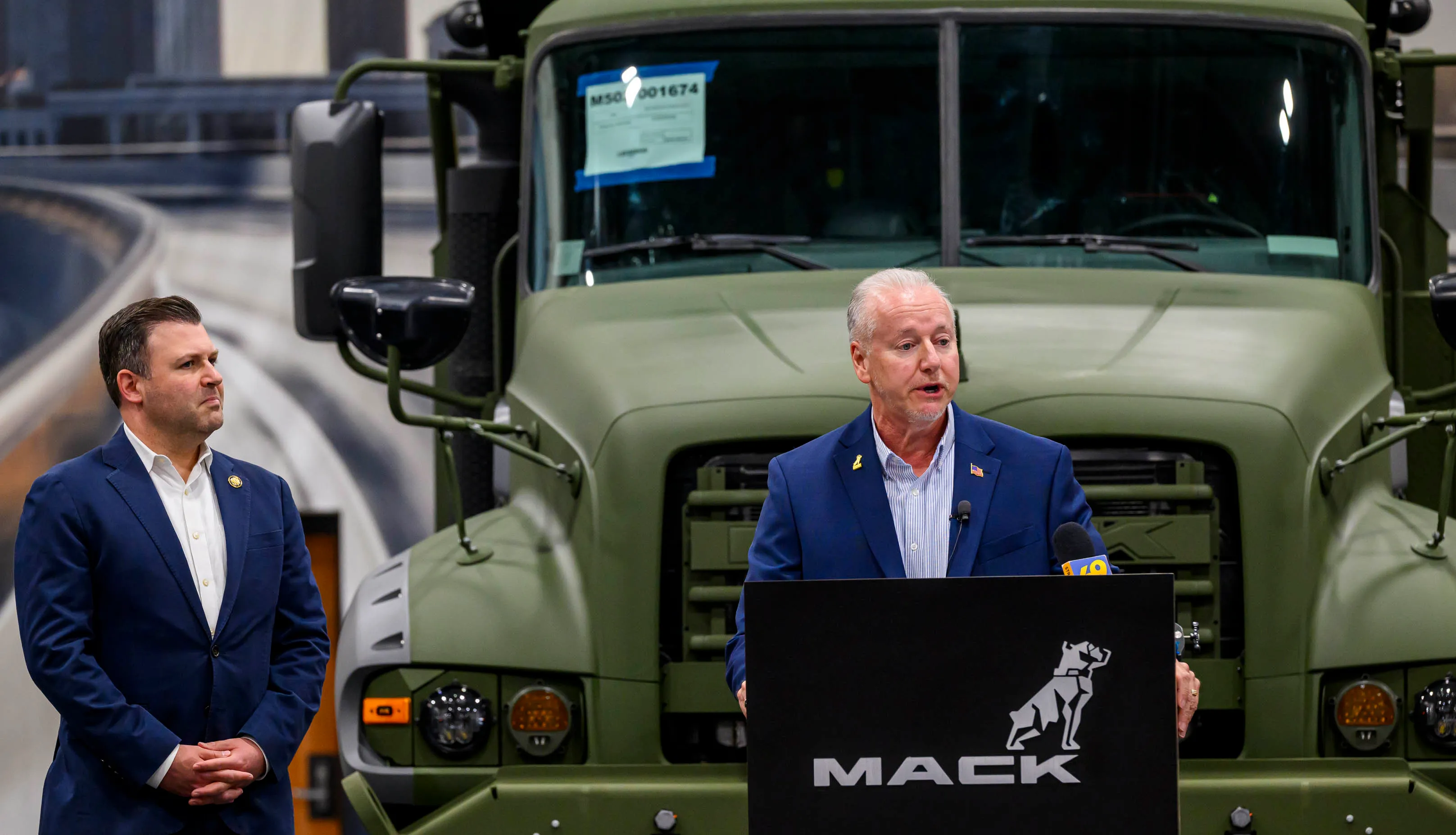 Mack Defense President David Hartzell speaks in front of the...