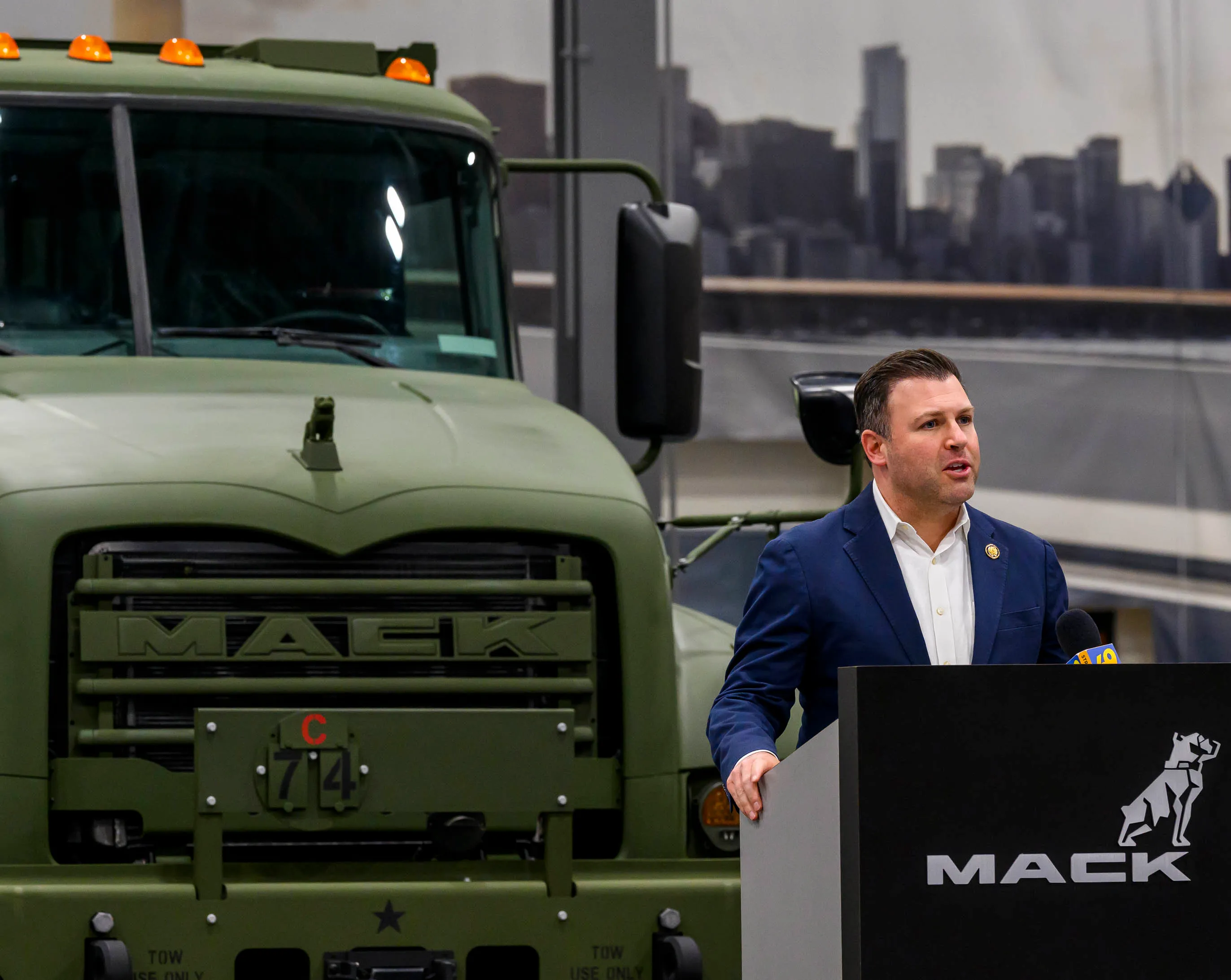 U.S. Rep. Ryan Makenzie speaks in front of Mack Defenseâs...