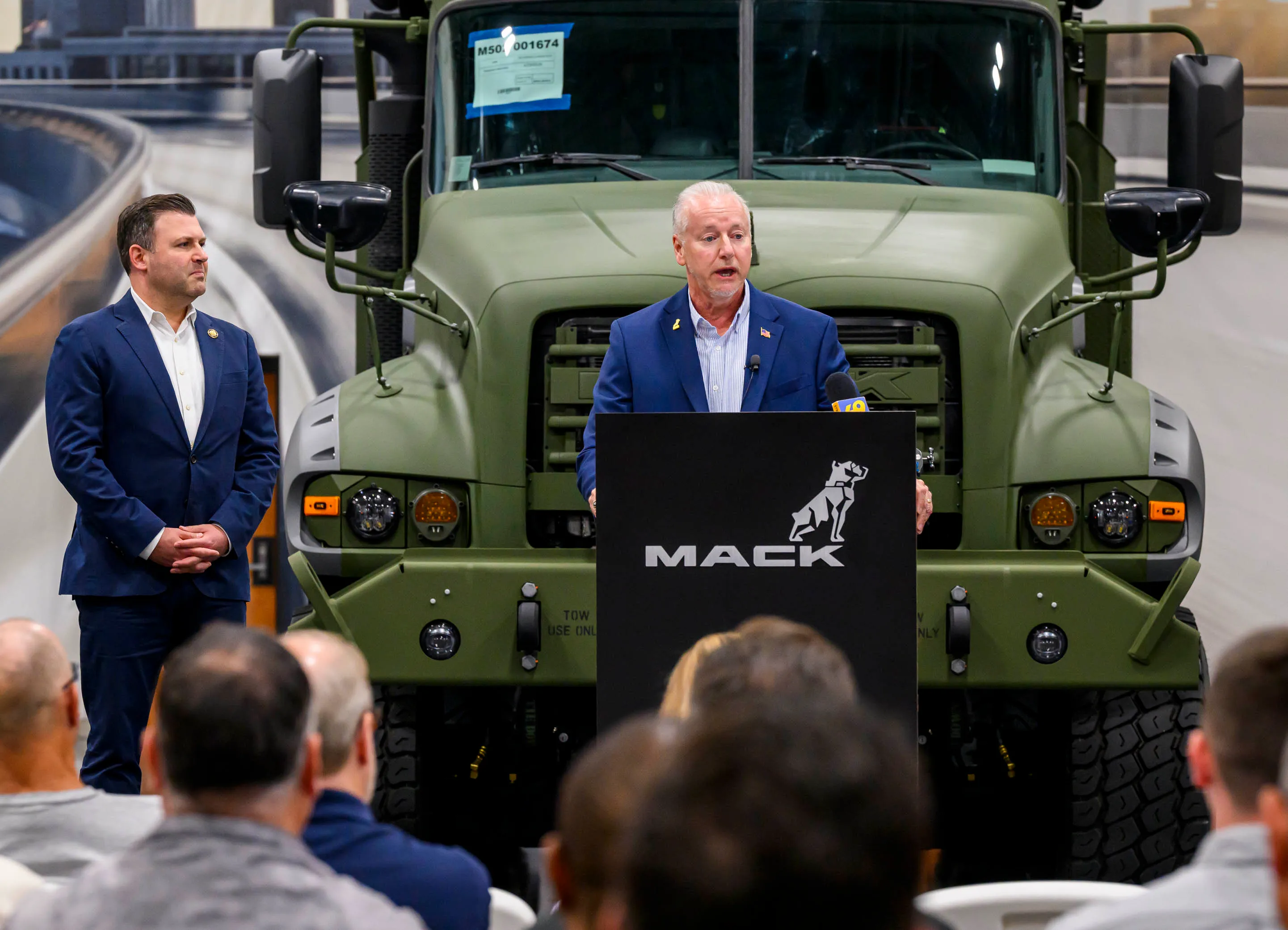 Mack Defense President David Hartzell speaks in front of the...