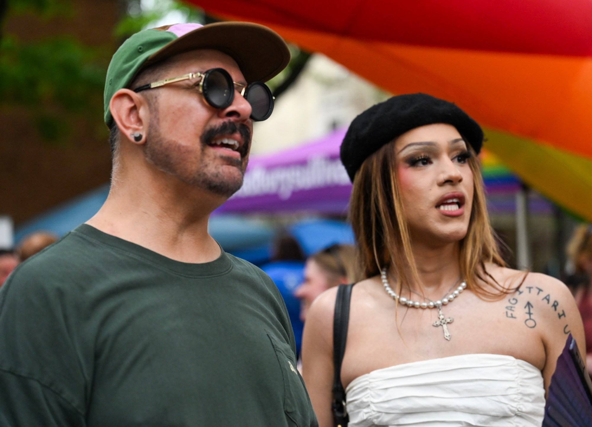 Jesse Turek and Maddy Baby watch a drag performance Sunday, June 14, 2026, at the Pride Party Palooza in Bethlehem. (Avery Folmar/The Morning Call)
