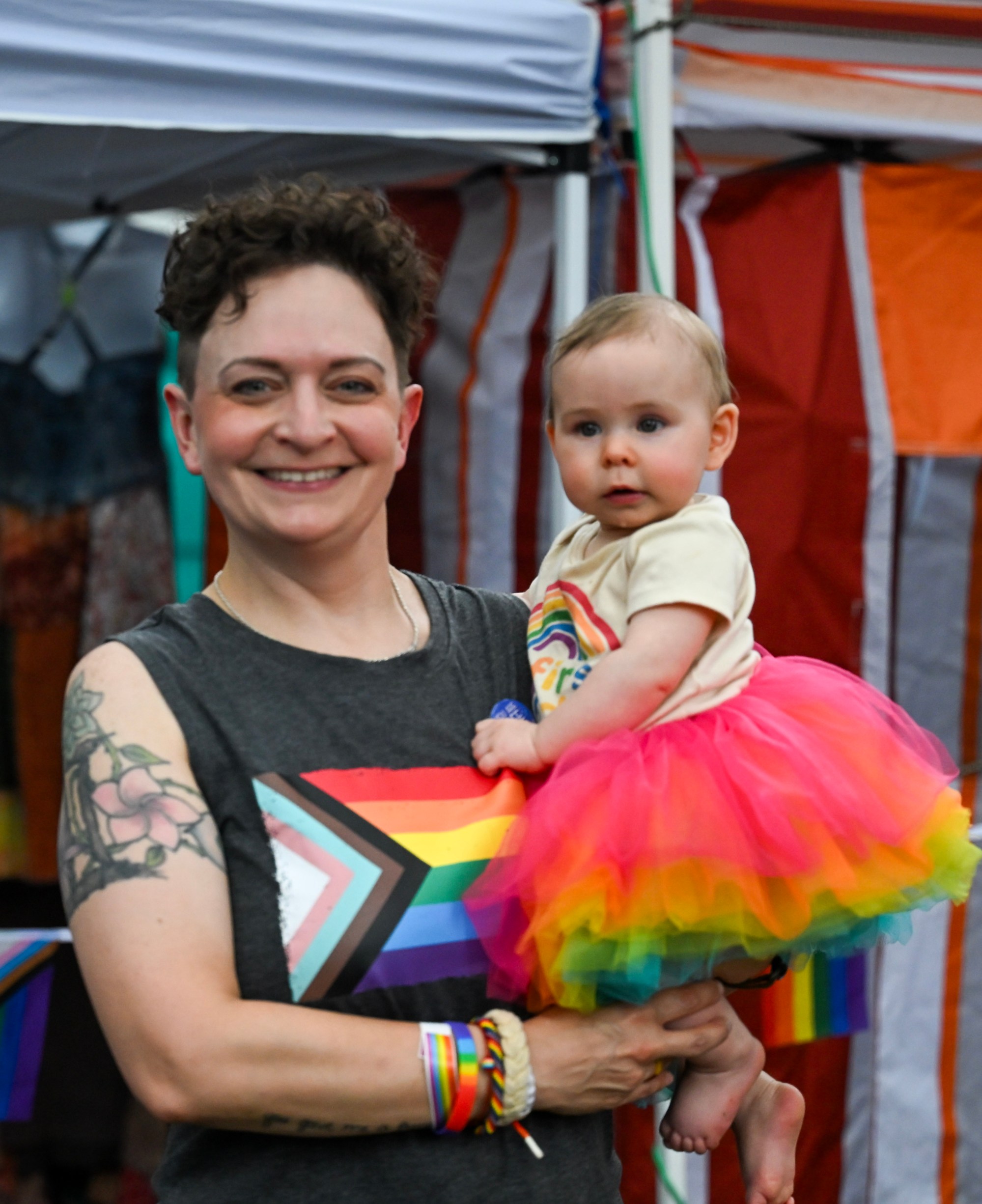 Stephanie Adams and her baby Harper Adams dress in pride colors Sunday, June 14, 2026, at the Pride Party Palooza in Bethlehem. (Avery Folmar/The Morning Call)