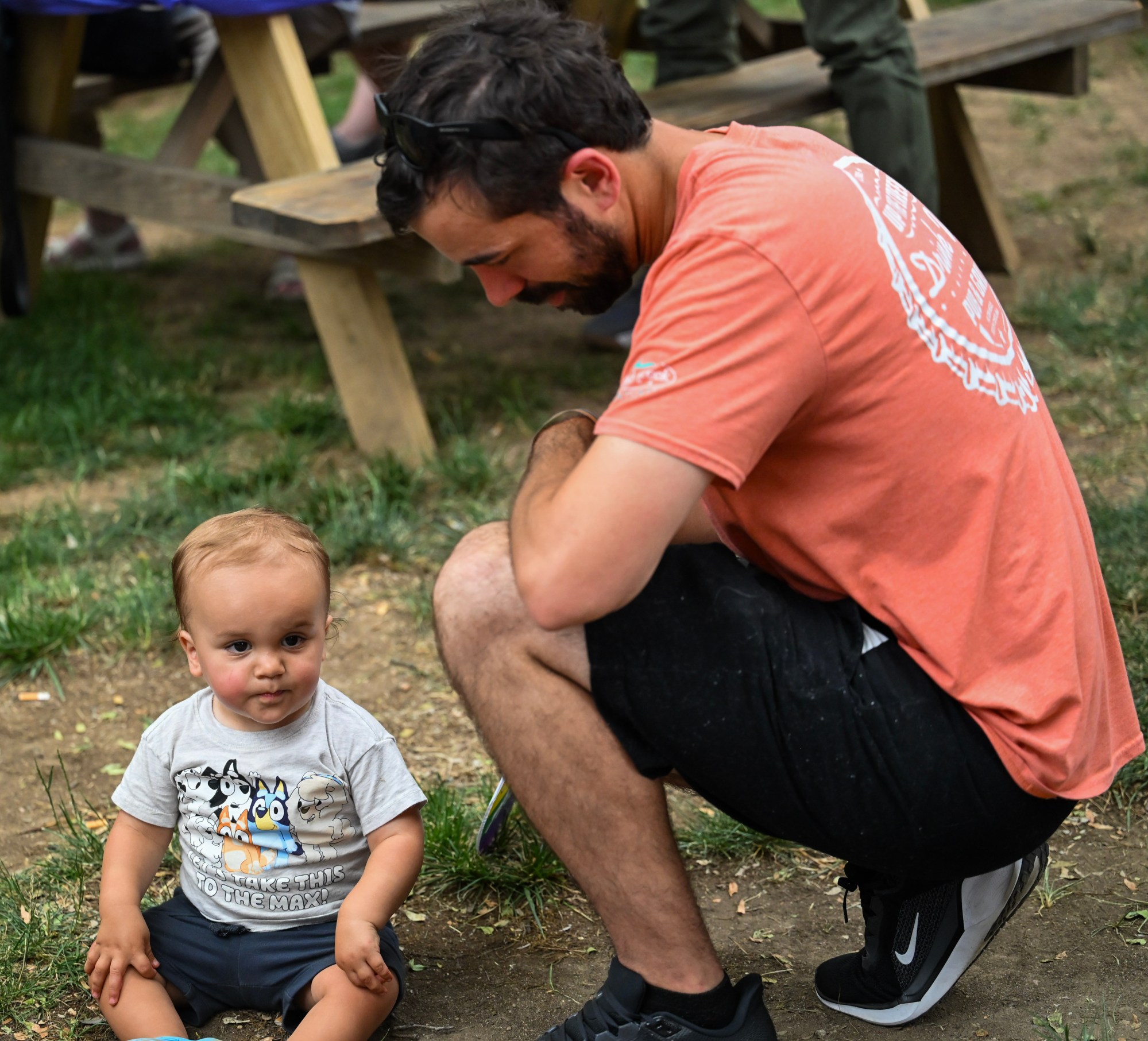 JR Harttenstine and his son, Anthony, sit in front of the stage Sunday, June 14, 2026, at the Pride Party Palooza in Bethlehem. (Avery Folmar/The Morning Call)