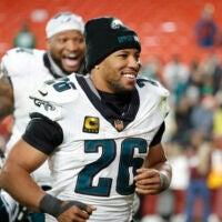 Dec 20, 2025; Landover, Maryland, USA; Philadelphia Eagles running back Saquon Barkley (26) runs off the field after the game against the Washington Commanders at Northwest Stadium.