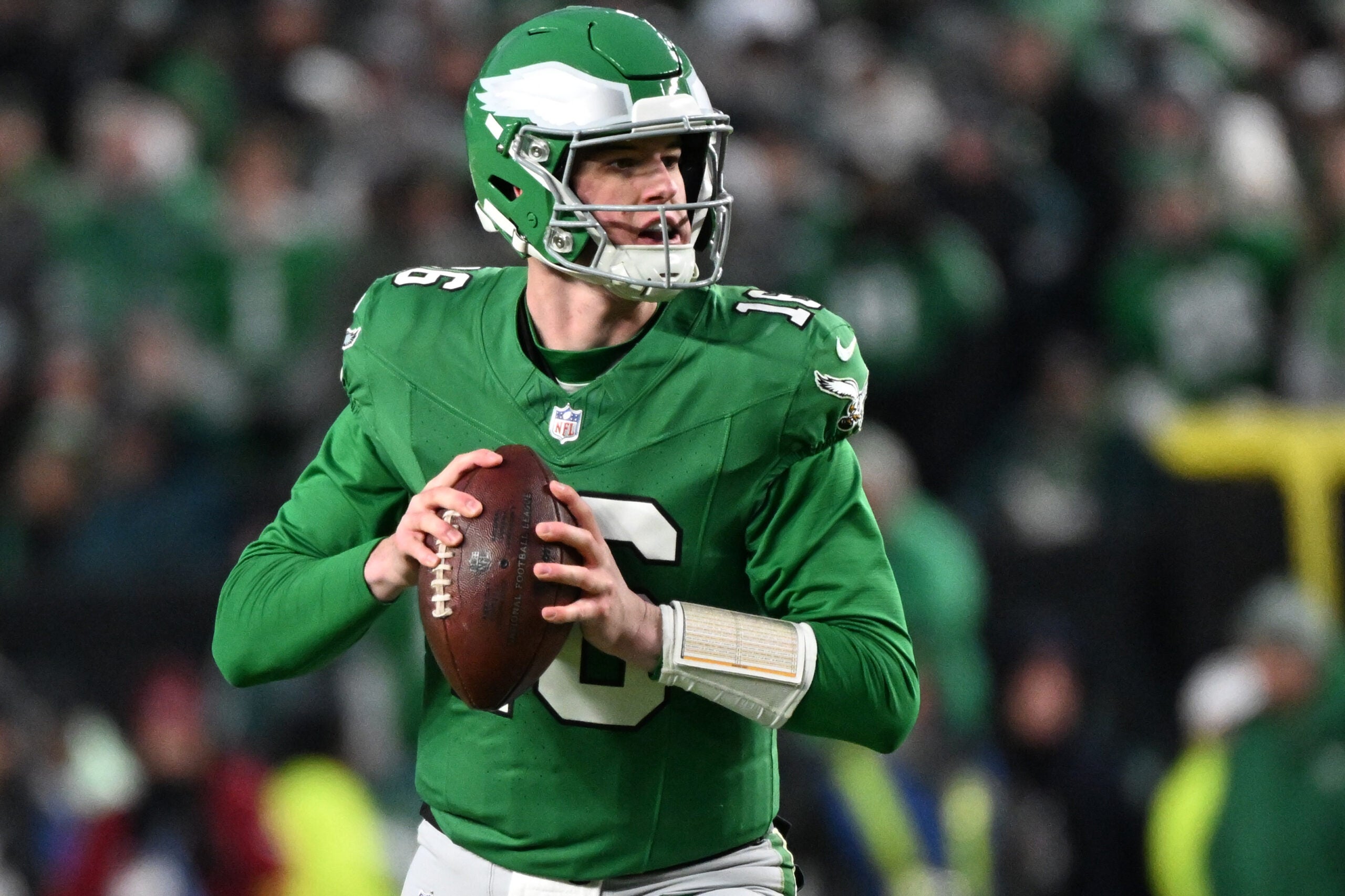 Jan 4, 2026; Philadelphia, Pennsylvania, USA; Philadelphia Eagles quarterback Tanner McKee (16) looks for a receiver against the Washington Commanders at Lincoln Financial Field.