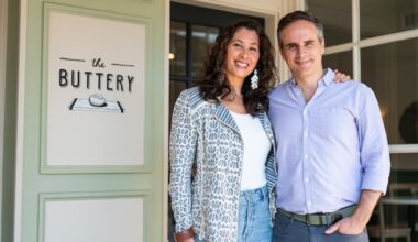 Silenia Rhoads (left) and John Rhoads (right), owners of The Buttery, stand for a portrait in front of their new location in Bryn Mawr on Wednesday, June 17, 2026.