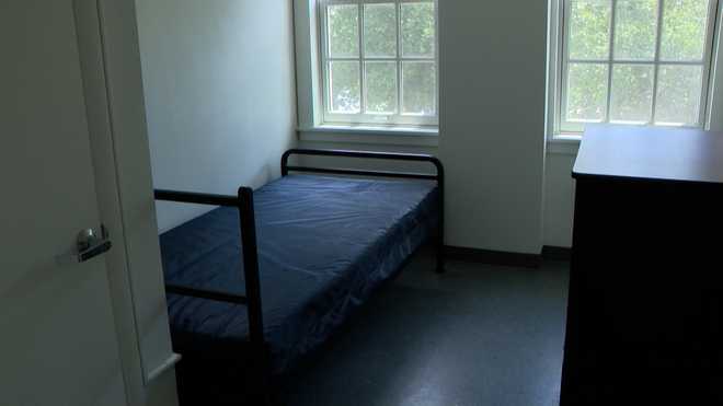 YMCA beds A room with a bed at Allegheny YMCA