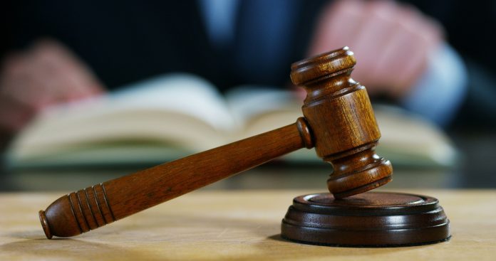 auction-or-scene-of-lawyers-or-notaries-with-gavel-judge-for-the-insurance-compensatio-SBI-351340596