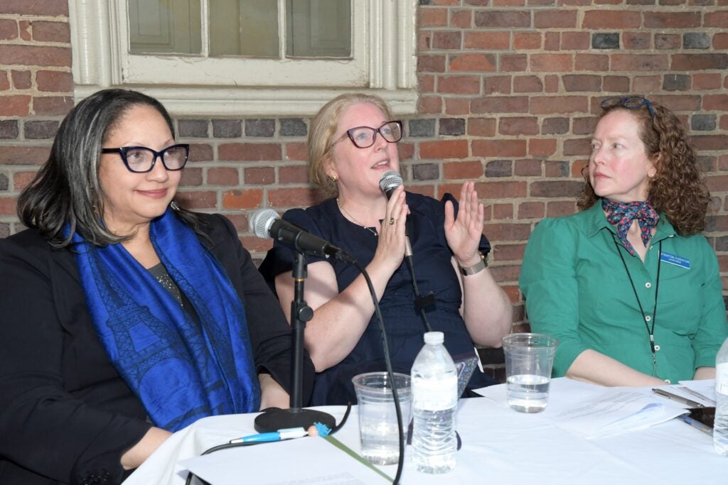 Sarah Glover, Emma Hart and Laura Keim sitting on the panel.