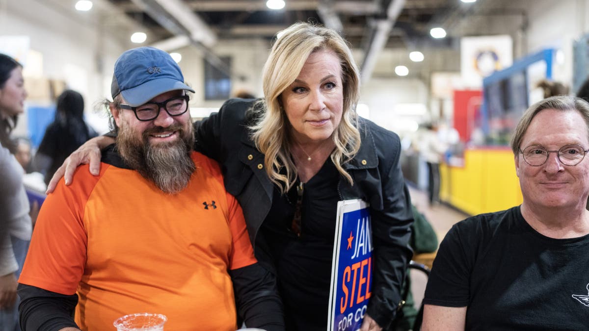 Janelle Stelson talking with patrons at Broad Street Market in Harrisburg, Pennsylvania