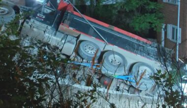 Dump truck falls into hole at site of water main break work in Pennsylvania